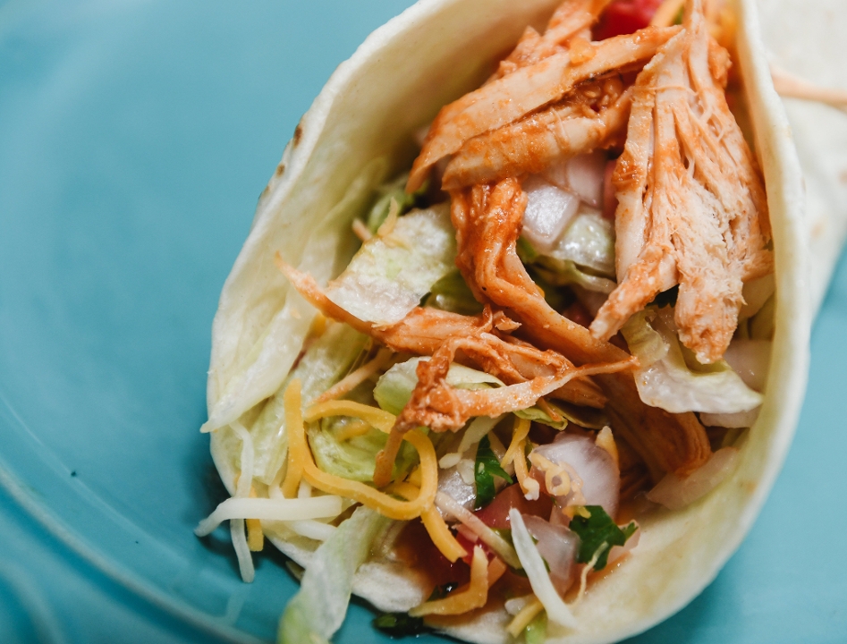 Soft tortilla shredded Chicken Taco.