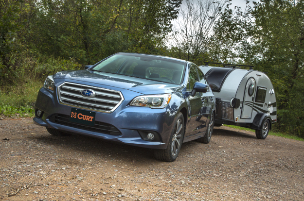 Subaru car towing teardrop camper with CURT class 1 trailer hitch