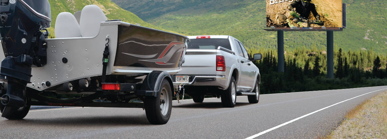 Pickup Truck Pulling Boat Trailer