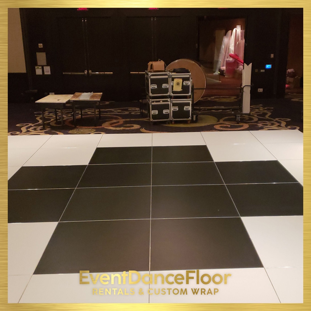 How does specialty dance floor branding contribute to the overall guest experience at a wedding reception?