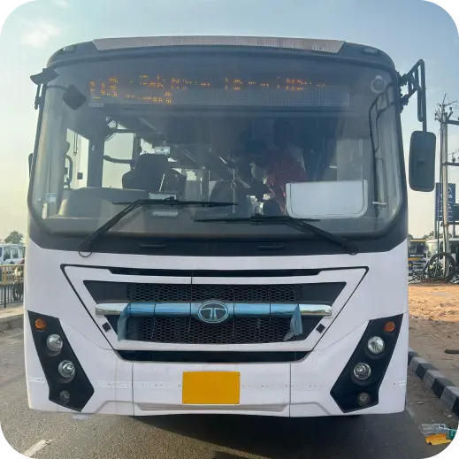 Luxury bus driving at sunset