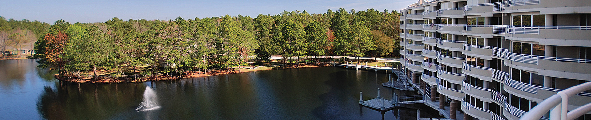 Exterior view of the lake alongside Cypress Village senior living community