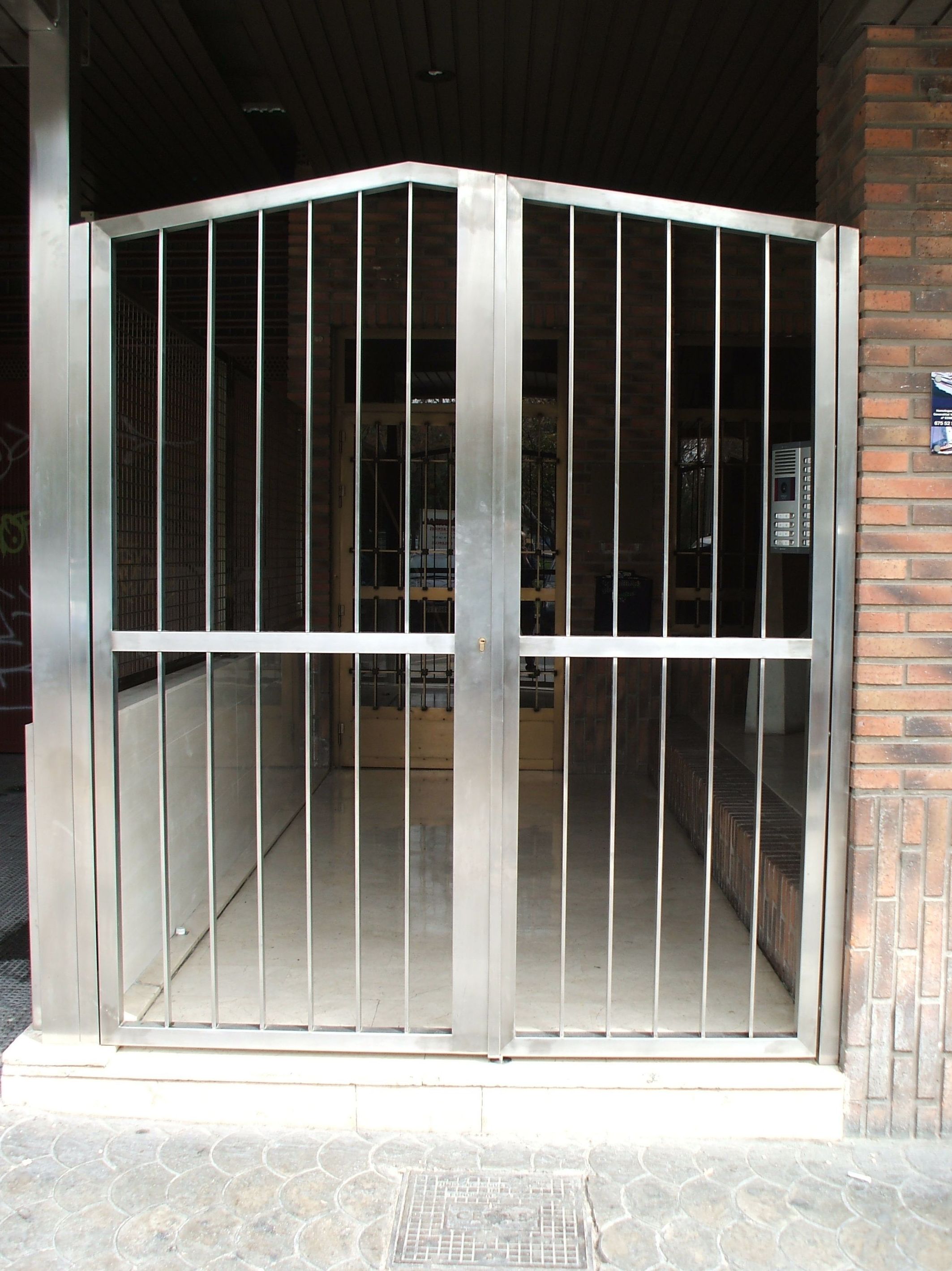 cancela de patio acero inox mate
