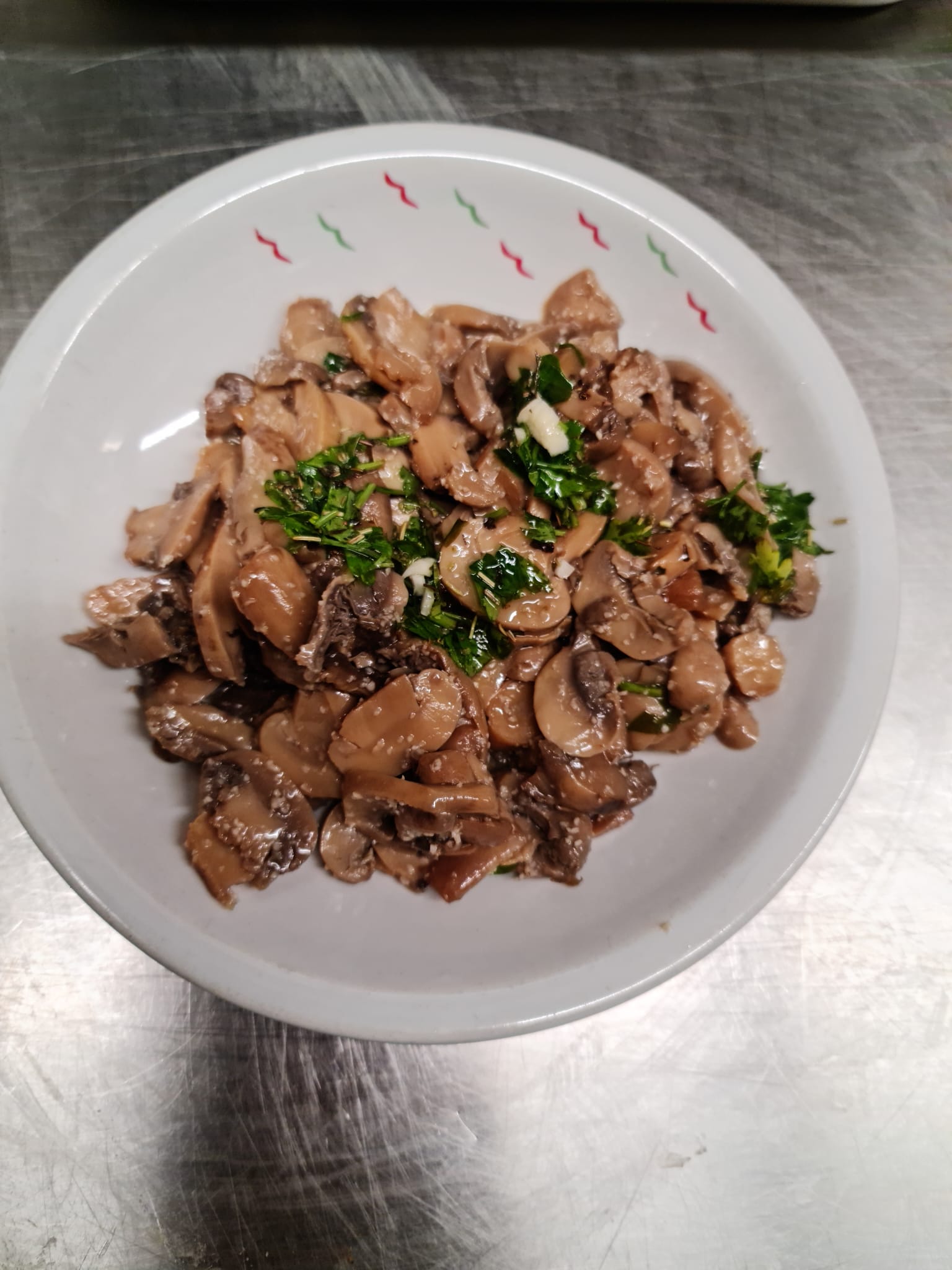 Champiñones con ajo y perejil