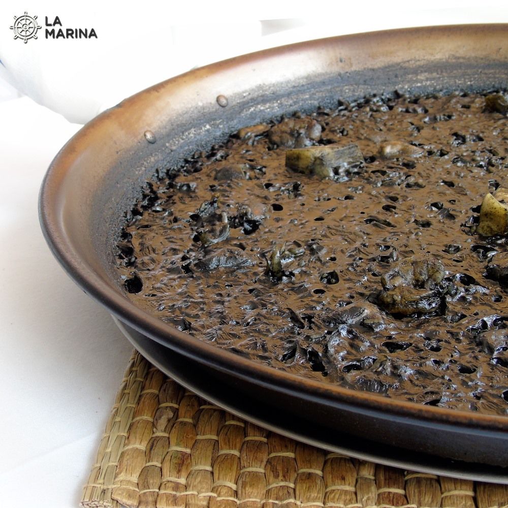 Arroz negro en la Playa de Puçol