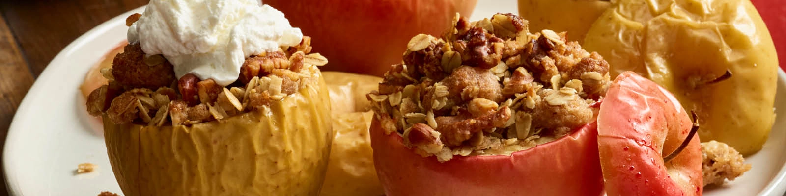 Baked Apples with Walnut Crumble and Bourbon Whipped Cream