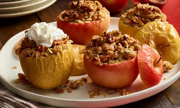 Baked Apples with Walnut Crumble and Bourbon Whipped Cream