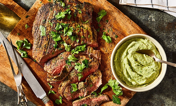 Big Batch Flank Steak with Creamy Chimichurri Sauce