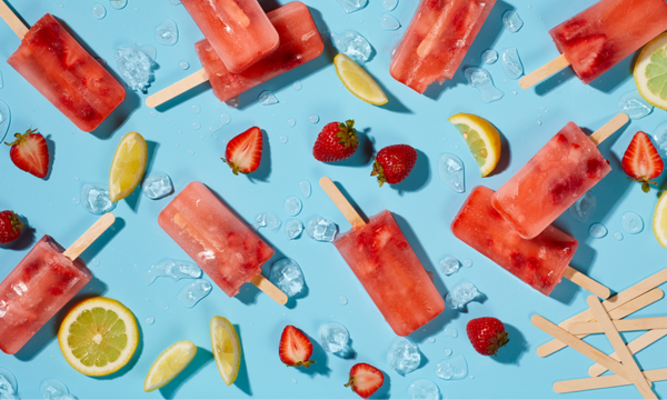 Popsicles, lemons, strawberries and ice 