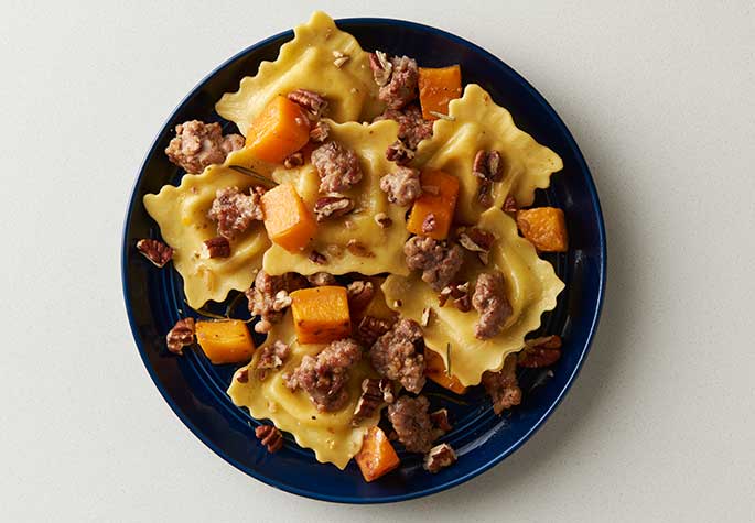 Four Cheese Ravioli with Butternut Squash, Pecan & Sausage recipe