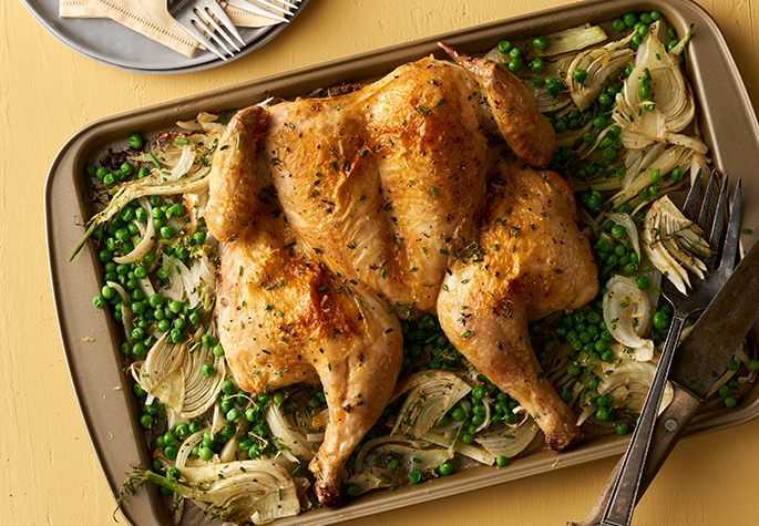 Roasted Spring Spatchcock Chicken with Fennel, Peas, Lemon, and Herbs