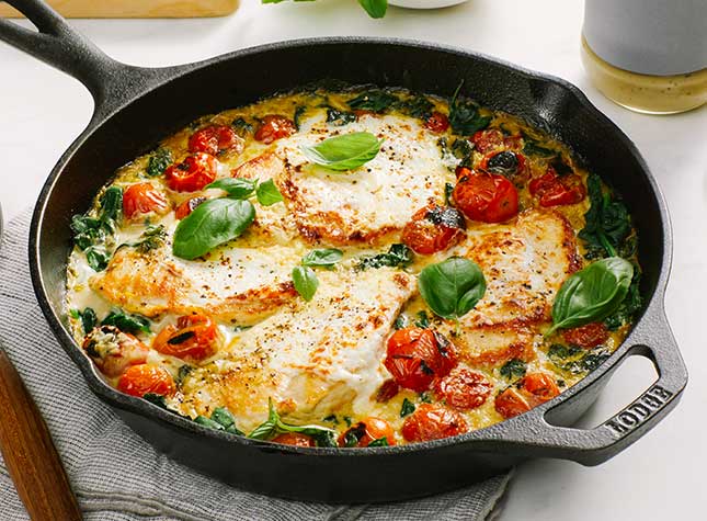 Skillet Creamy Pesto Chicken Caprese