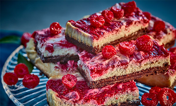 Raspberry cheesecake slice with chocolate biscuit base
