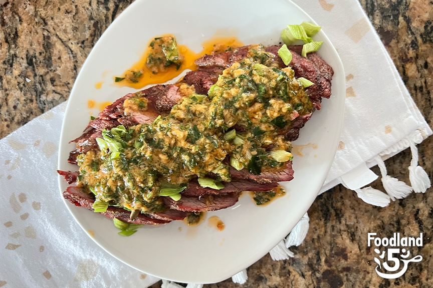 Calabrian Chili Butter Steaks with Charred Green Onions