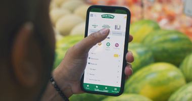 customer using Fresh Thyme app on phone