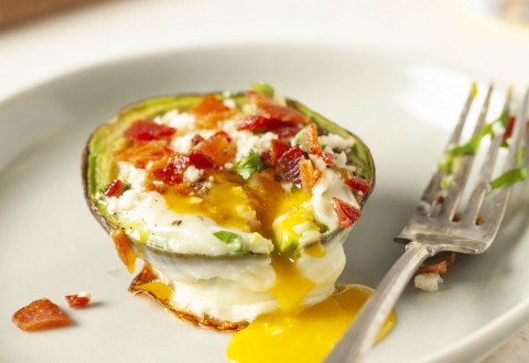 Recipe:  Egg in an Avocado with Bacon and Cotija Cheese