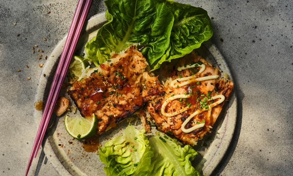 Baked Salmon coated in a chilli mayonnaise served with rice and lettuce