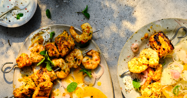 Chermoula King Prawn and Salmon Skewers with Lime Yogurt and Orange Fennel Rocket Salad