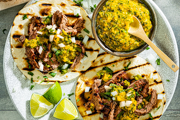 Grilled Skirt Steak Tostadas with Mango Chimichurri