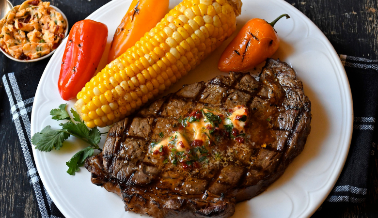 Grilled Rib Eye Steaks with Smoky Chipotle Butter