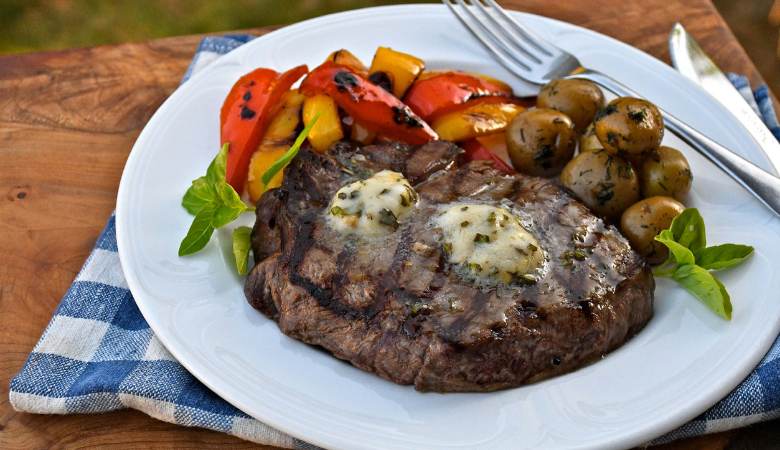 Sirloin Steaks with Sizzling Peppers and Basil Garlic Butter