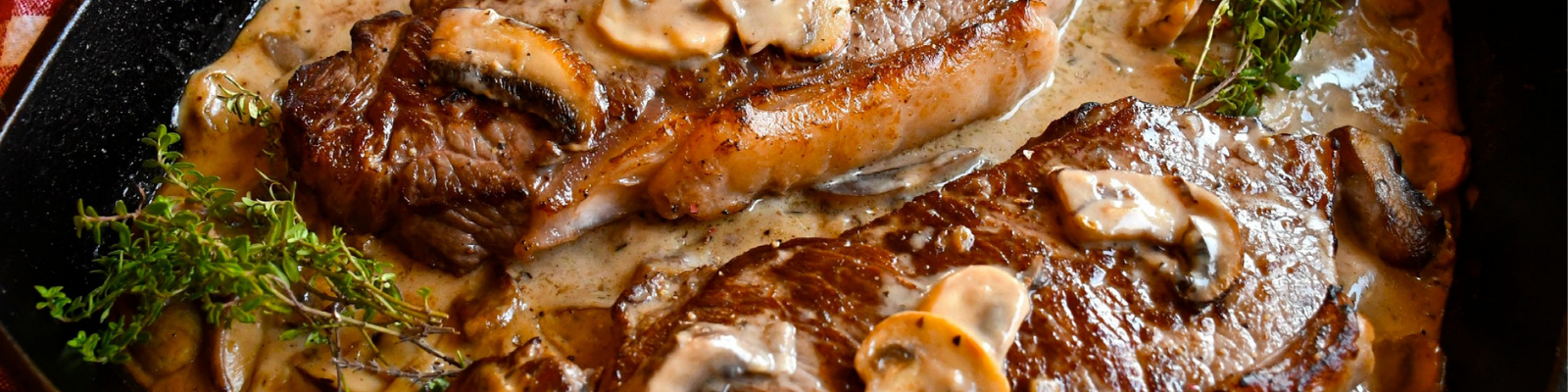 Strip Loin Steaks with Mushroom Whisky Sauce 