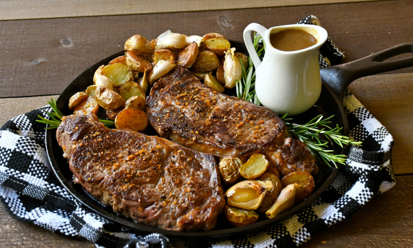 Strip Loin Steaks with Garlic Rosemary Roasted Potatoes and Jus