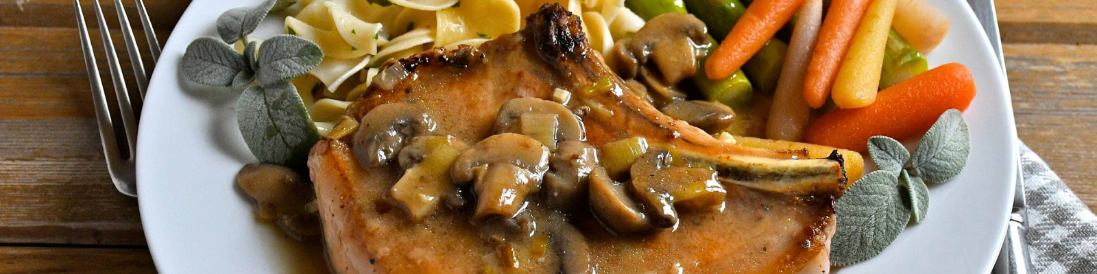 Tender Baked Pork Chops in Mushroom Leek Sauce