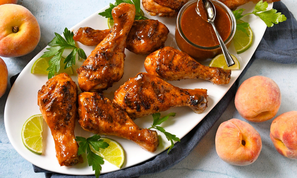 Grilled Chicken Drumsticks with Zesty Peach BBQ Sauce