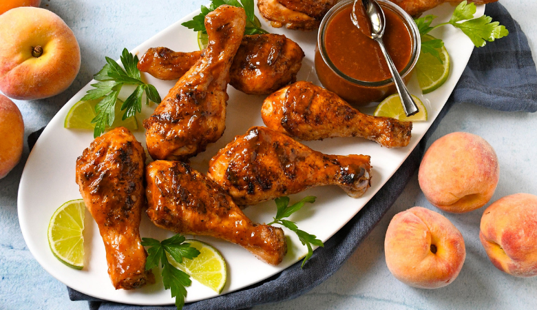 Grilled Chicken Drumsticks with Zesty Peach BBQ Sauce