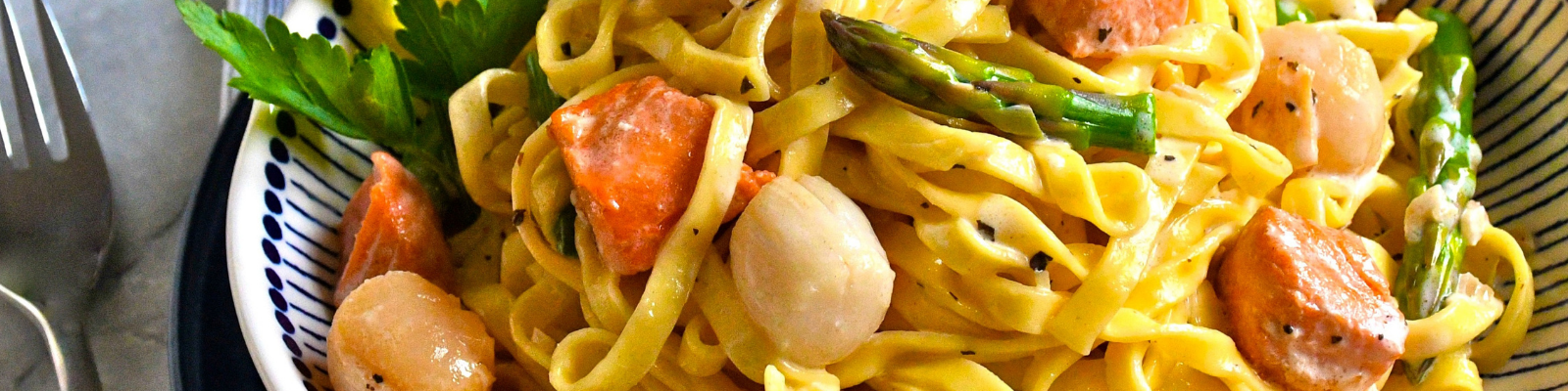 Creamy Fettuccini with Scallops, Steelhead and Asparagus