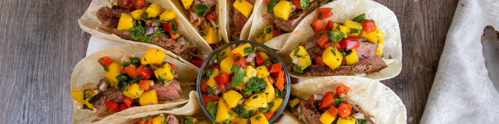 Striploin Steak Tacos with Mango Salsa