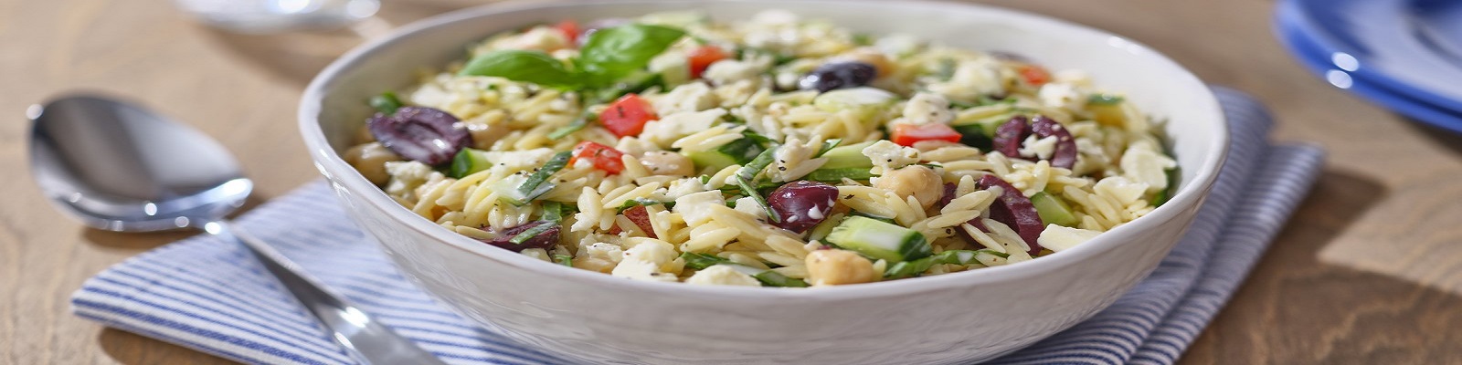 Mediterranean Orzo Salad with Creamy Garlic Oregano Dressing.