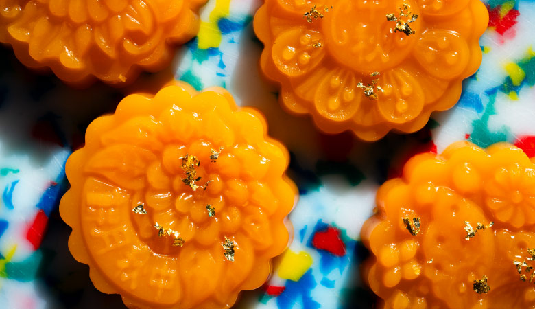 orange collagen mooncake jelly with gold flakes