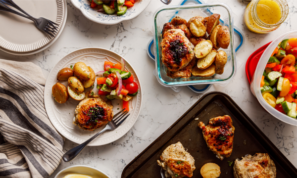 Greek Chicken with Lemon Potatoes & Tomato Avocado Greek Salad spread