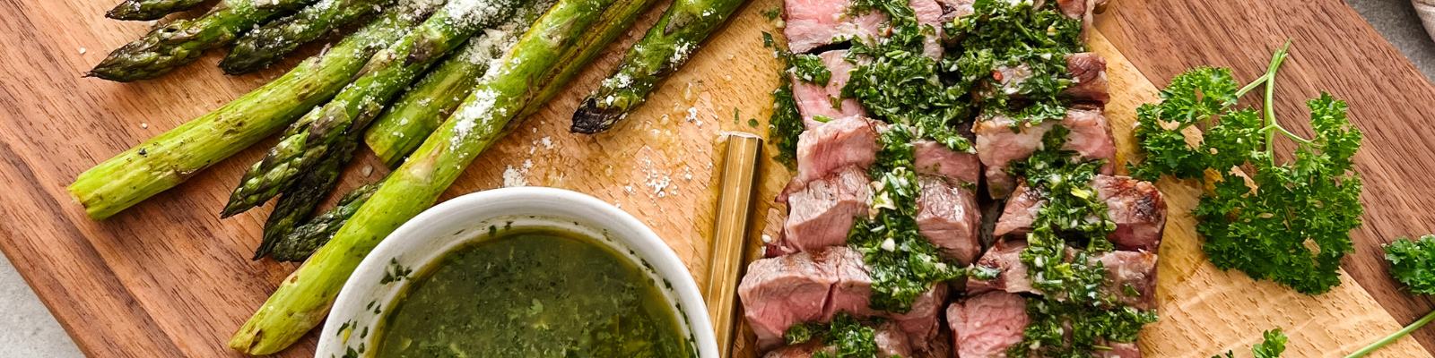 Grilled Balsamic Asparagus and Steak Topped with Chimichurri Sauce