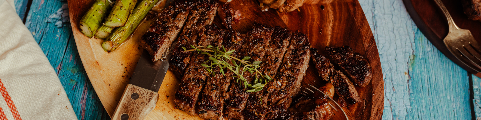 Grilled Steak with Loaded Hasselback Potatoes and Cowboy Butter