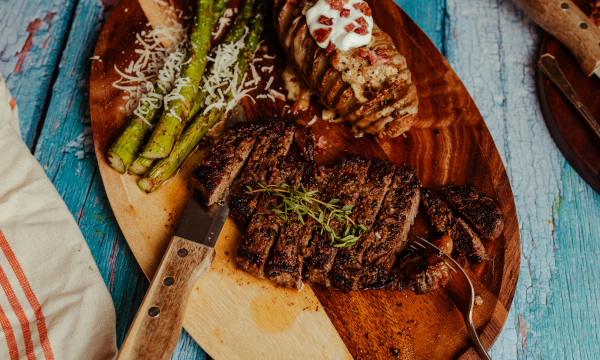 Grilled Steak with Loaded Hasselback Potatoes and Cowboy Butter