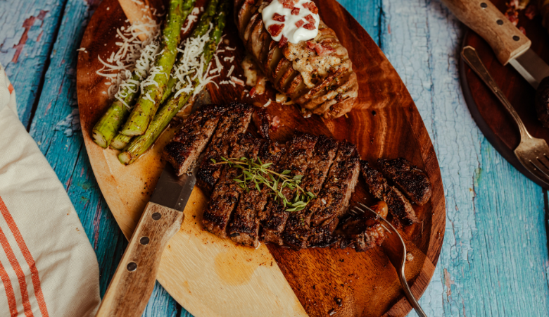 Grilled Steak with Loaded Hasselback Potatoes and Cowboy Butter