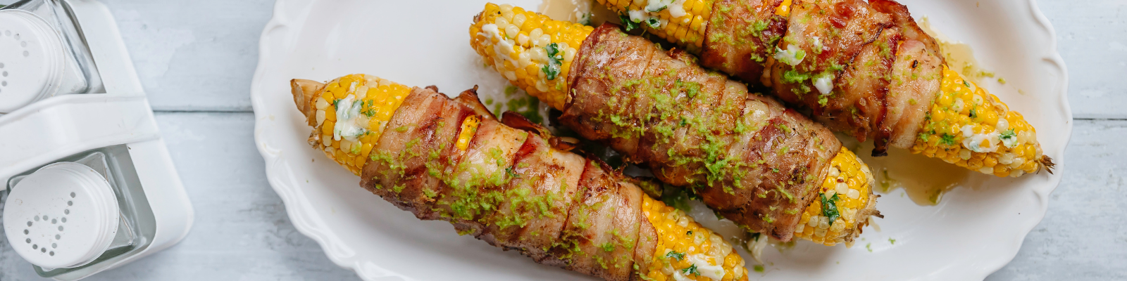 Sweet and Spicy Bacon Wrapped Corn