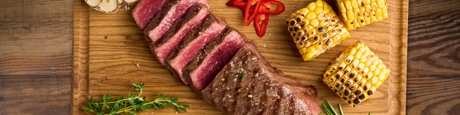 BBQ Strip Loin Steak with Grilled Corn