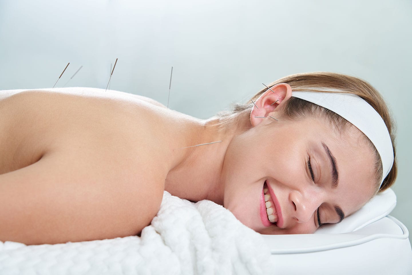 Massage & Akupunktur 70 Minuter 