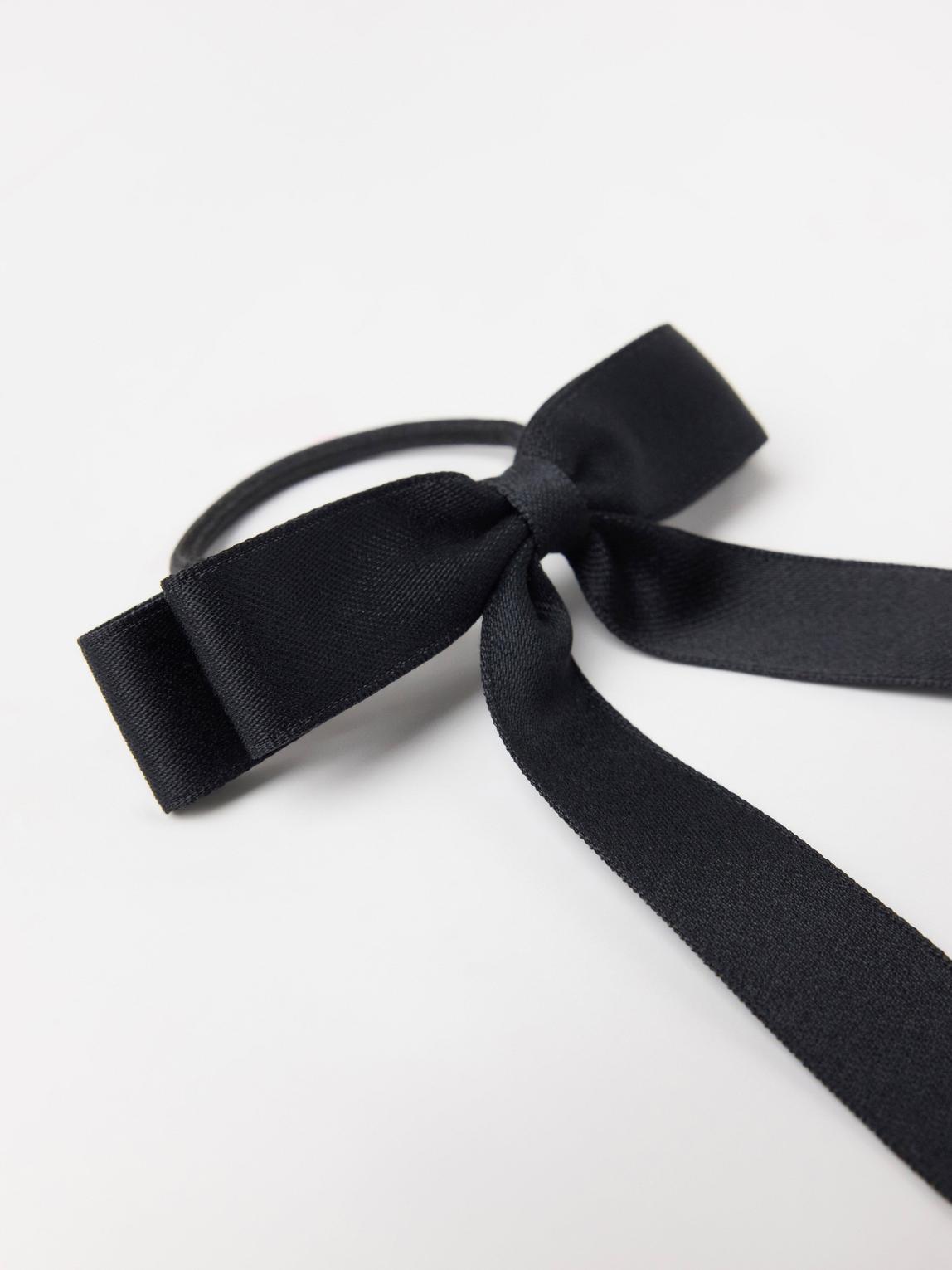 Elegant hårsnodd med rosett