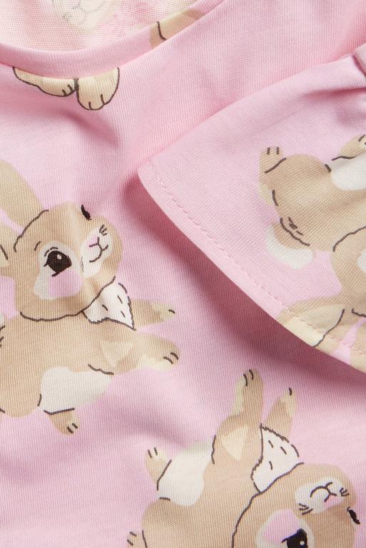 Ljusrosa volangtopp med kaninmotiv