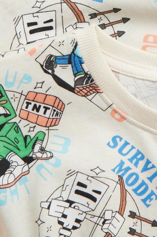 Ljusrosa volangtopp med kaninmotiv