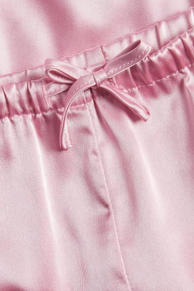 Ljusrosa satinskorst för barn