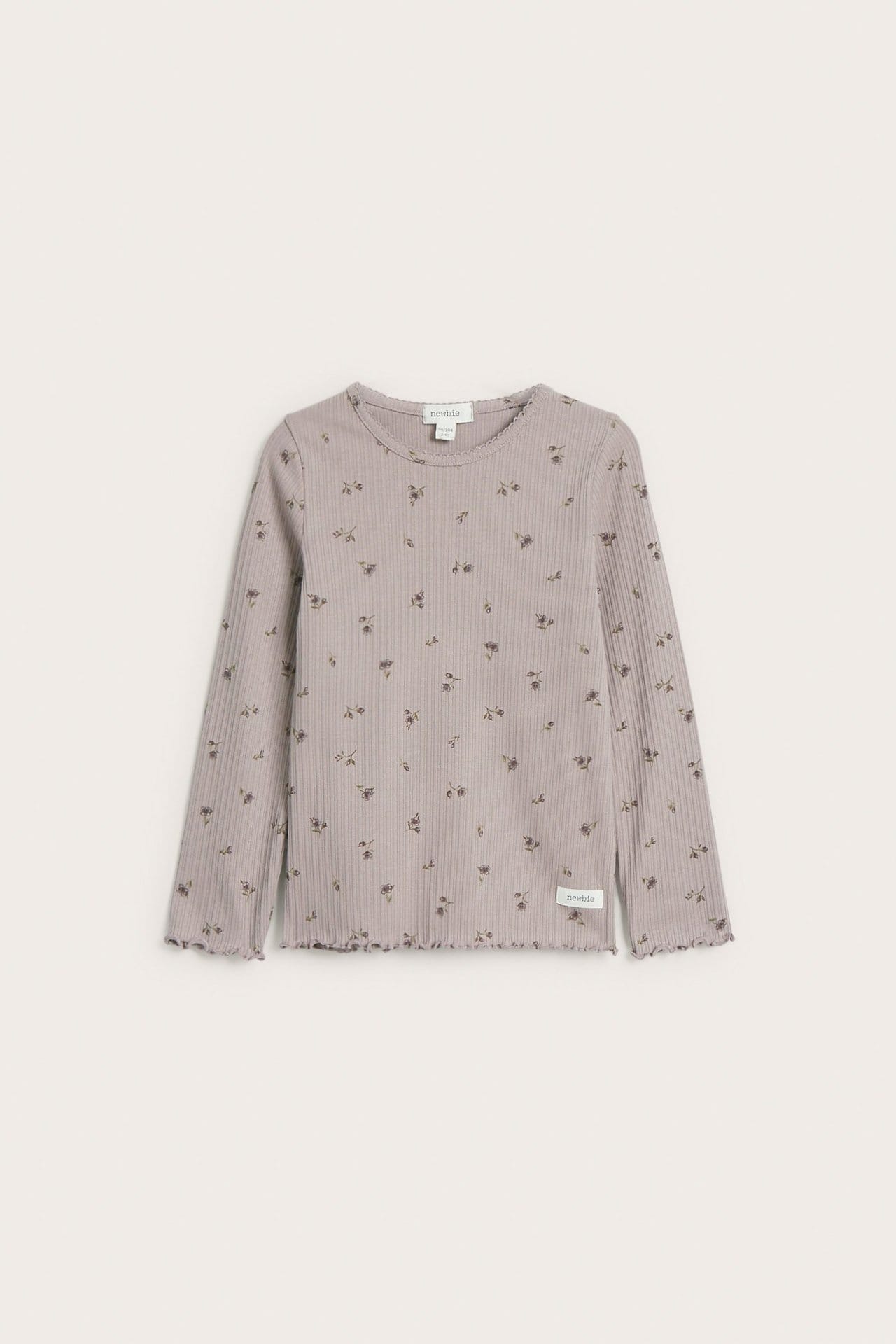 Grön blommig topp med spetsvolang