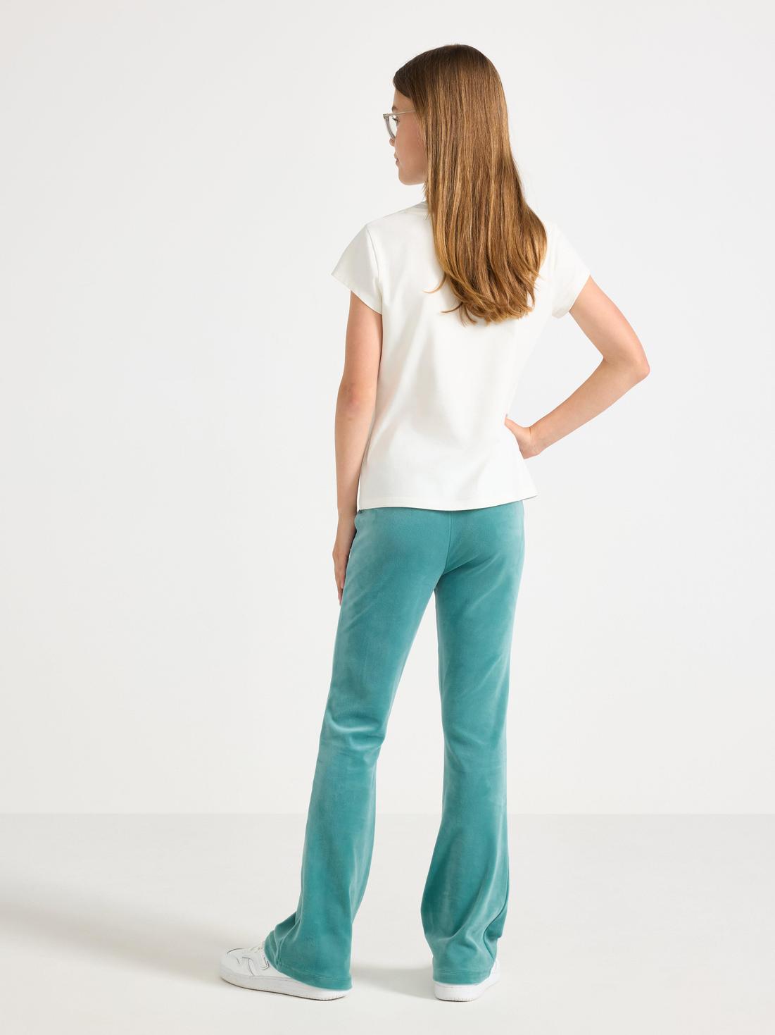 Utsvängda velourbyxor för damer