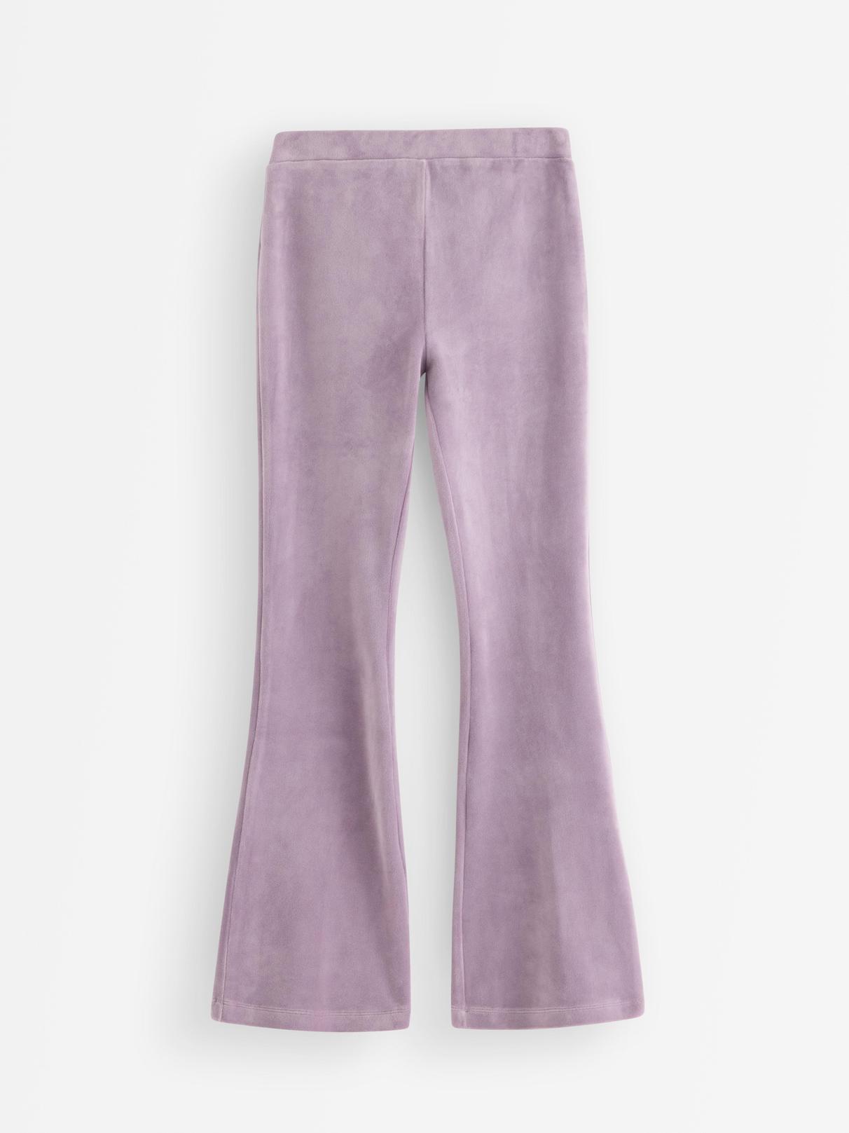 Utsvängda velourbyxor för damer