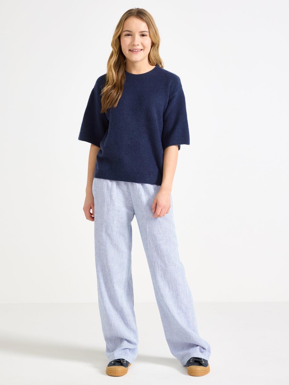 Utsvängda velourbyxor för damer